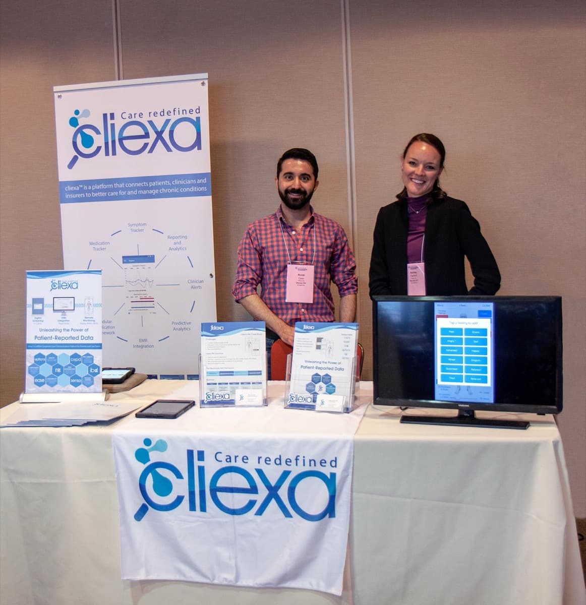 Jeffrey and colleague at cliexa conference booth
